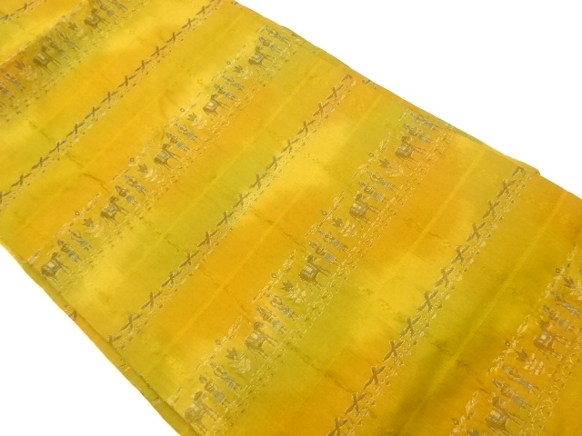 横段に馬・人物模様織出し名古屋帯